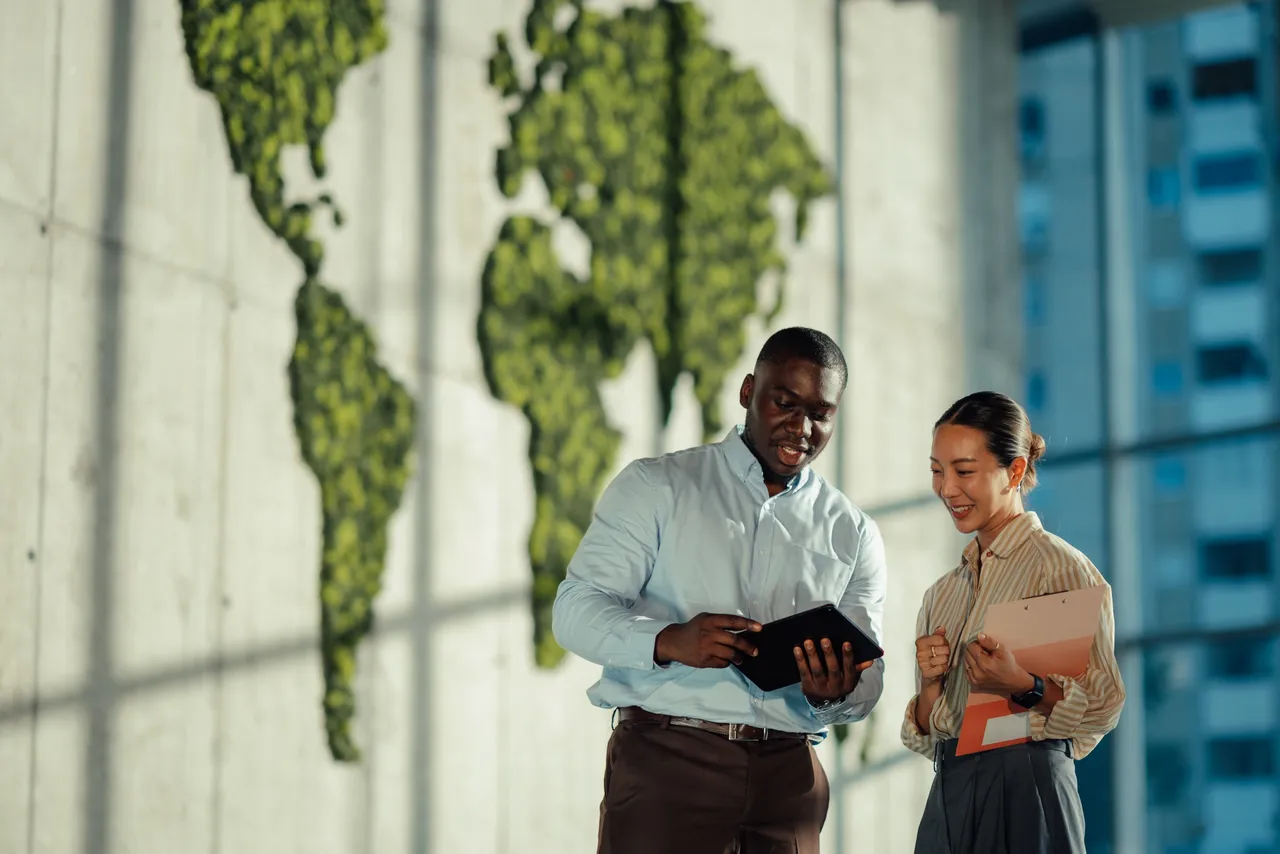 Illustration representing eco-friendly IT solutions and green technology, featuring energy-efficient data centers, green leaves intertwined with servers, cloud computing symbols, renewable energy, and sustainable growth. Clean, modern, digital art style.